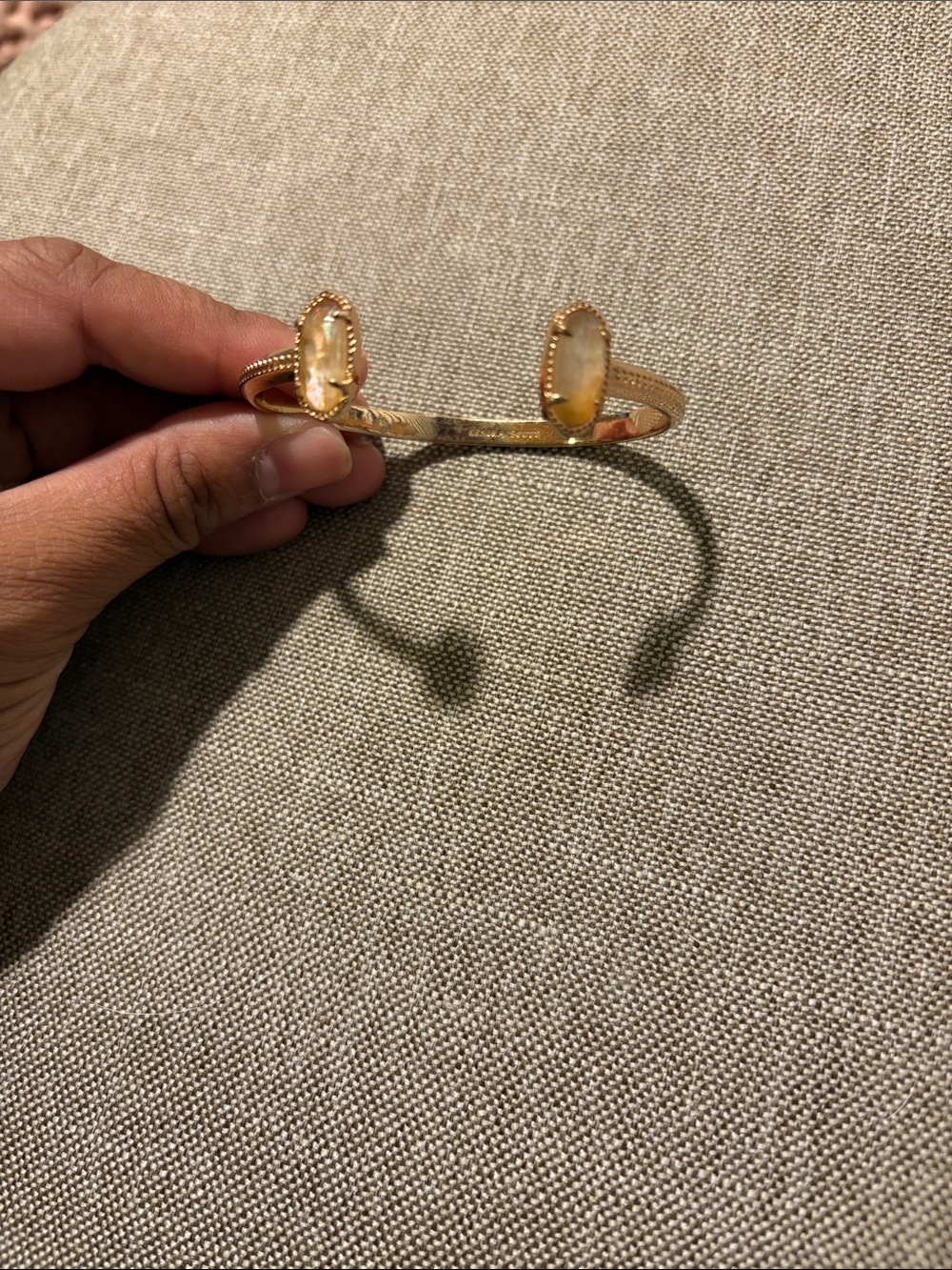 Kendra Scott Gold Cuff Bracelet with peachy Stone Ends